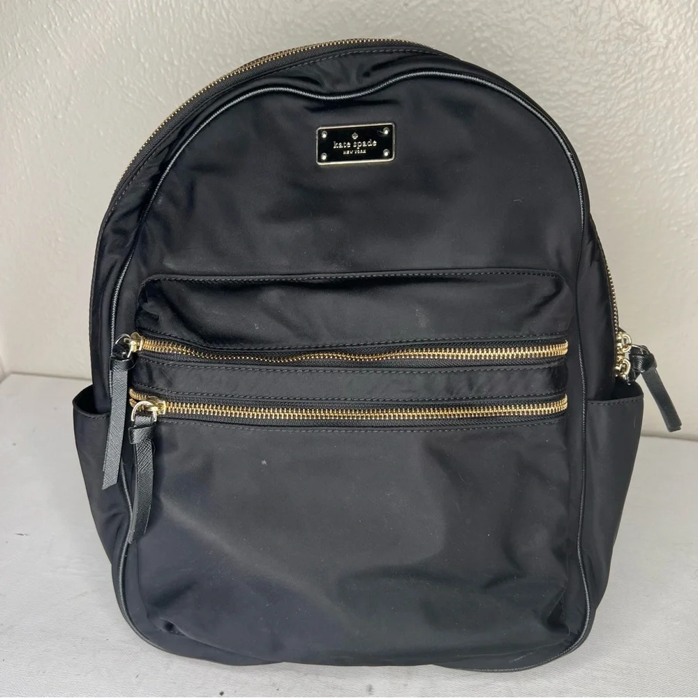 Kate Spade black gold zippers back pack